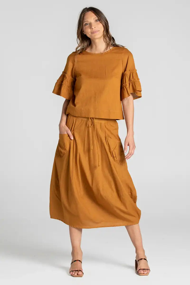 Boom Shankar Guru Skirt in Mustard front view with matching top and front pouch pocket