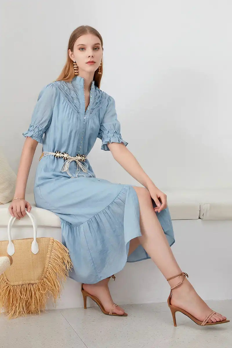 Celestial Linen Midi Dress with Shell-Tie Belt with model sitting down