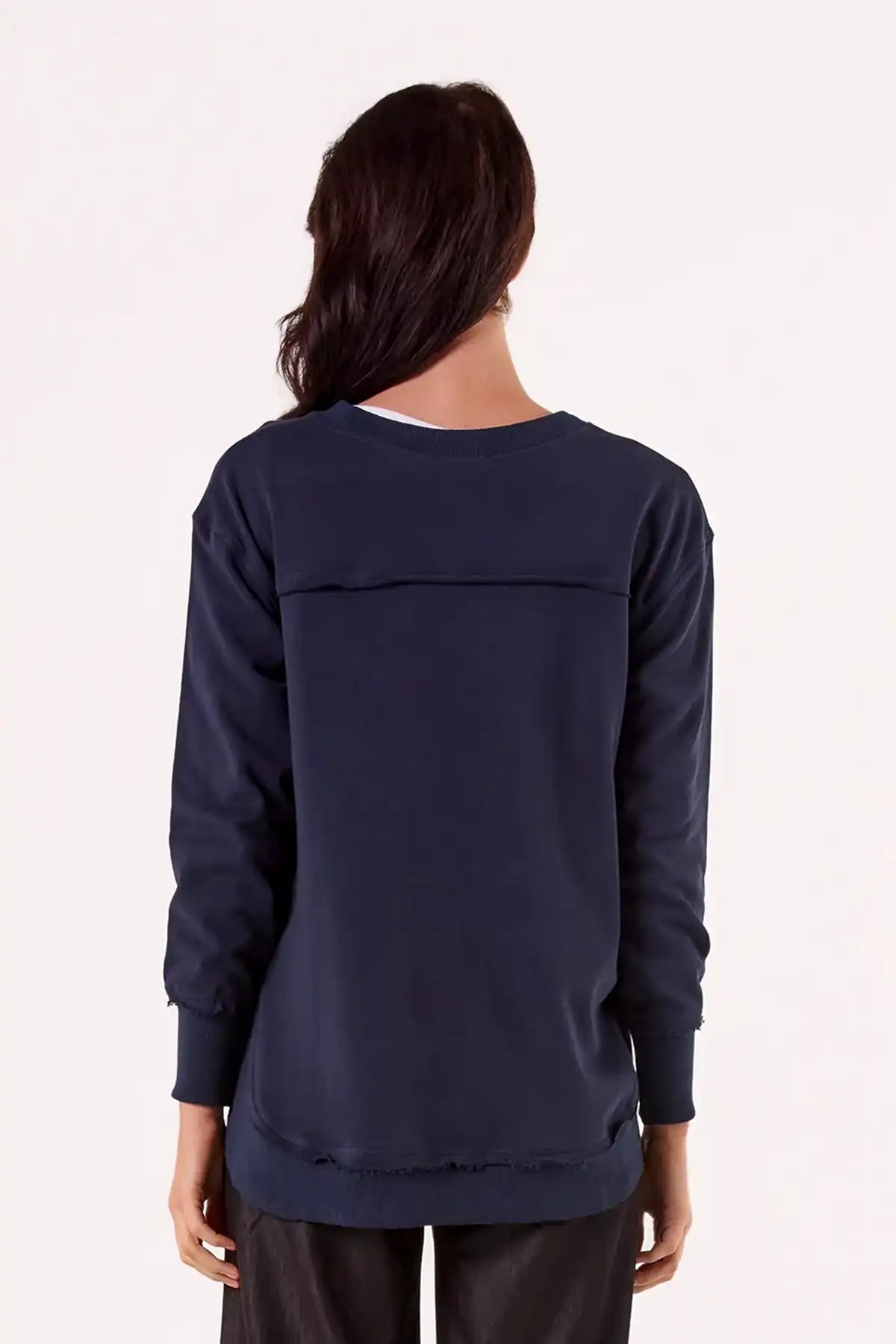 Person wearing a Chille Everyday Wander Pullover in Navy long-sleeve top on a white background back view