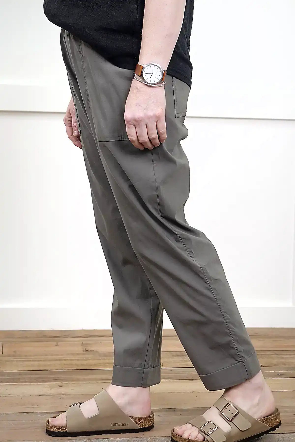 Clara Cotton Blend Pull-On Pants in Olive side view showing cuff on timber floor white background