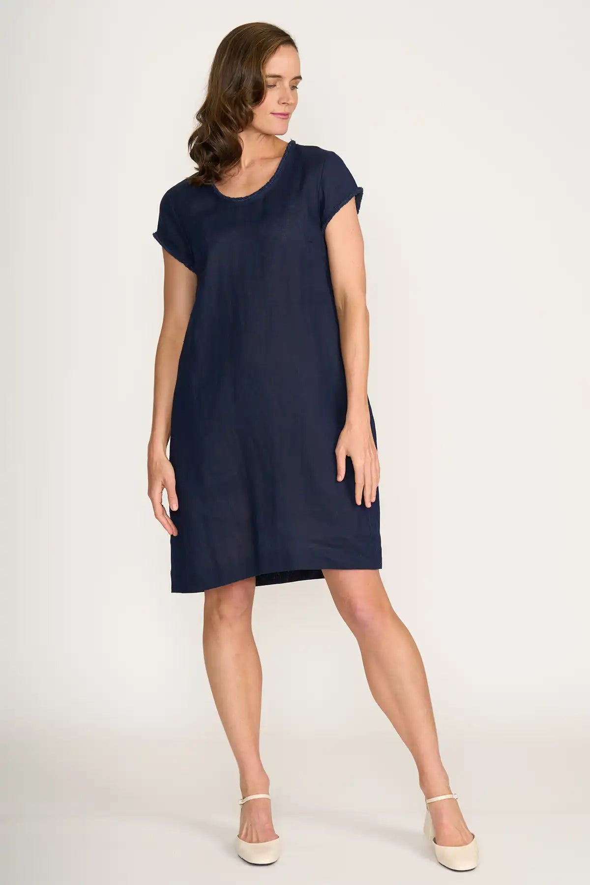 Woman wearing a Foil Linen Festival Dress in Eclipse on a white background side view