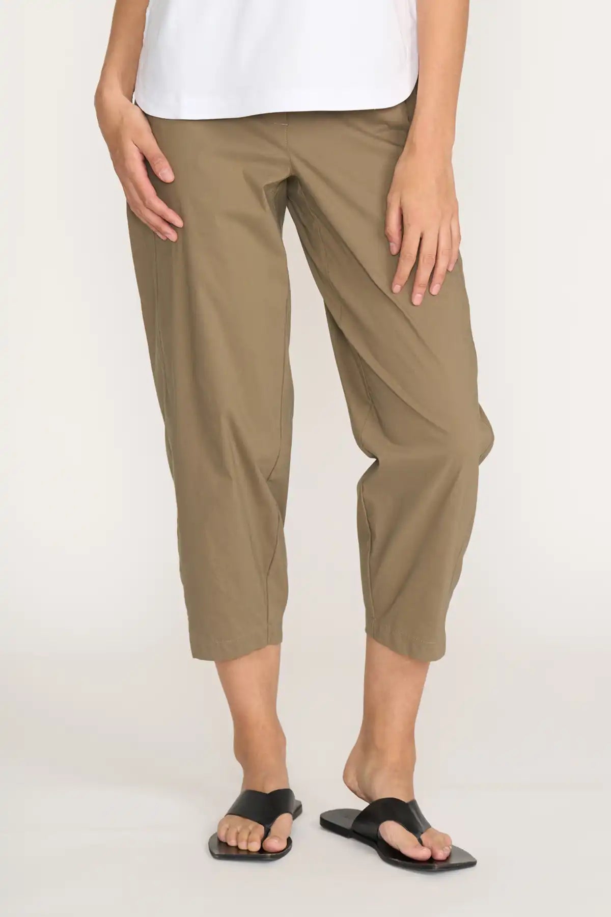 Person wearing Foil Pump it Up Pant in Dune on a white background detailed view