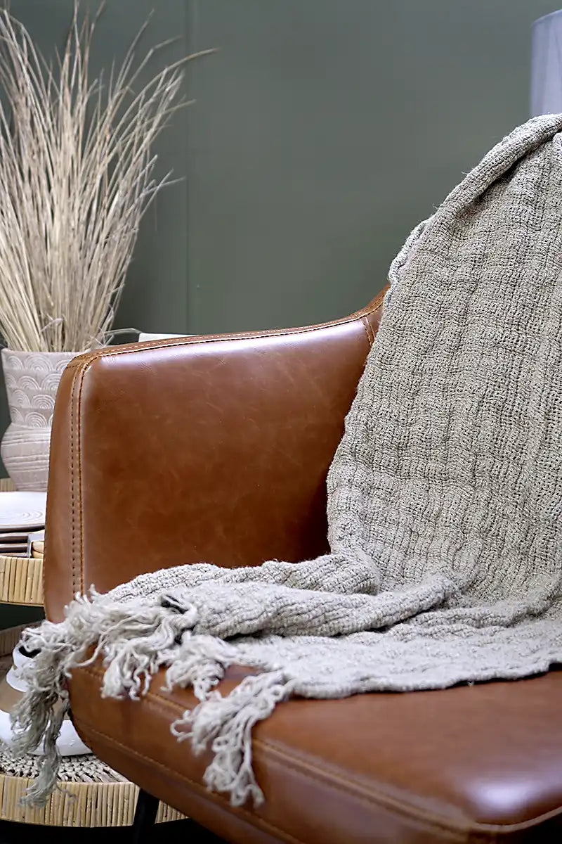 Le Rive Linen Scarf Hand-Loomed in Natural Taupe draped over a chair