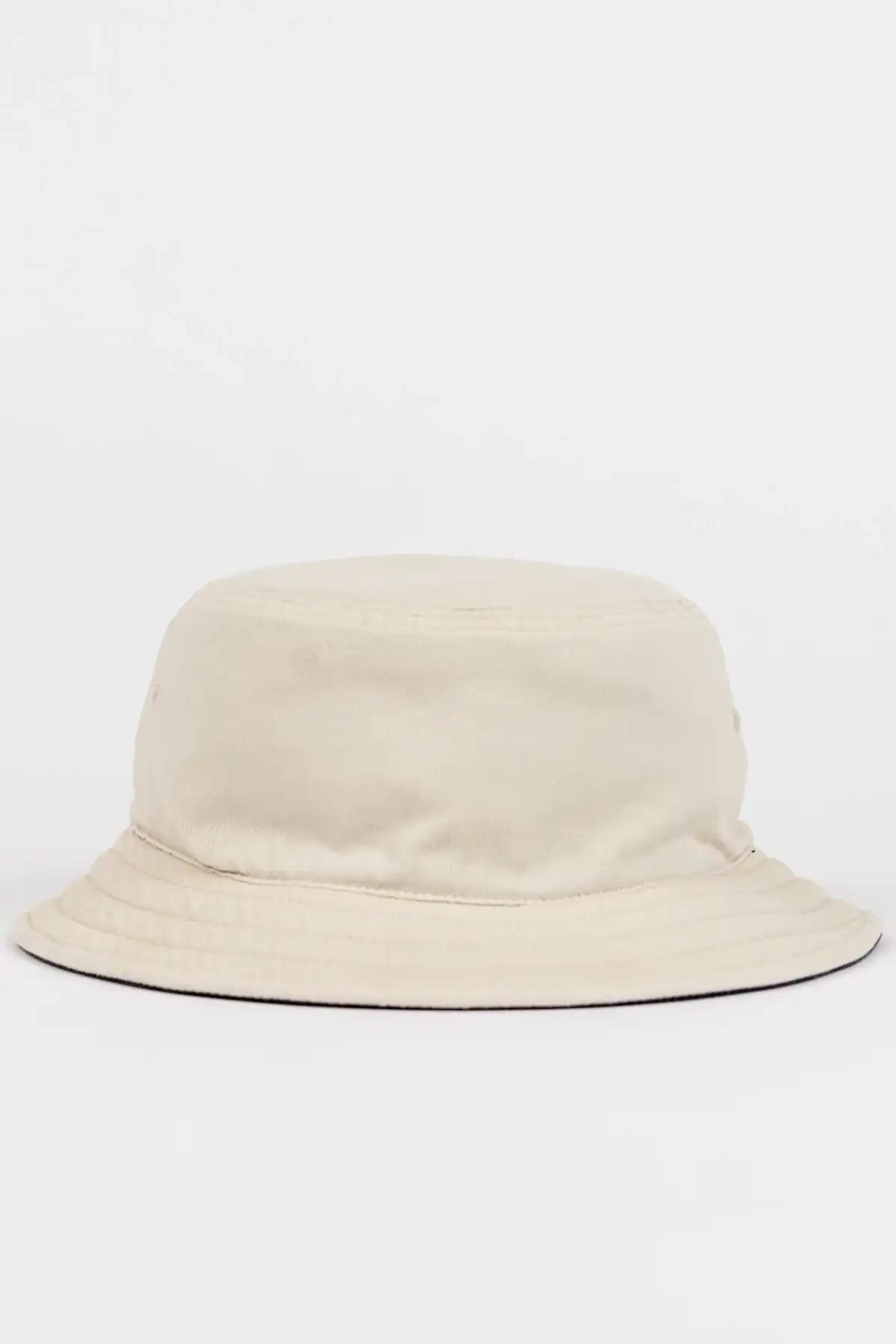 Rusty Kick Flip Reversible Bucket Hat showing oatmeal side back of hat on a white background