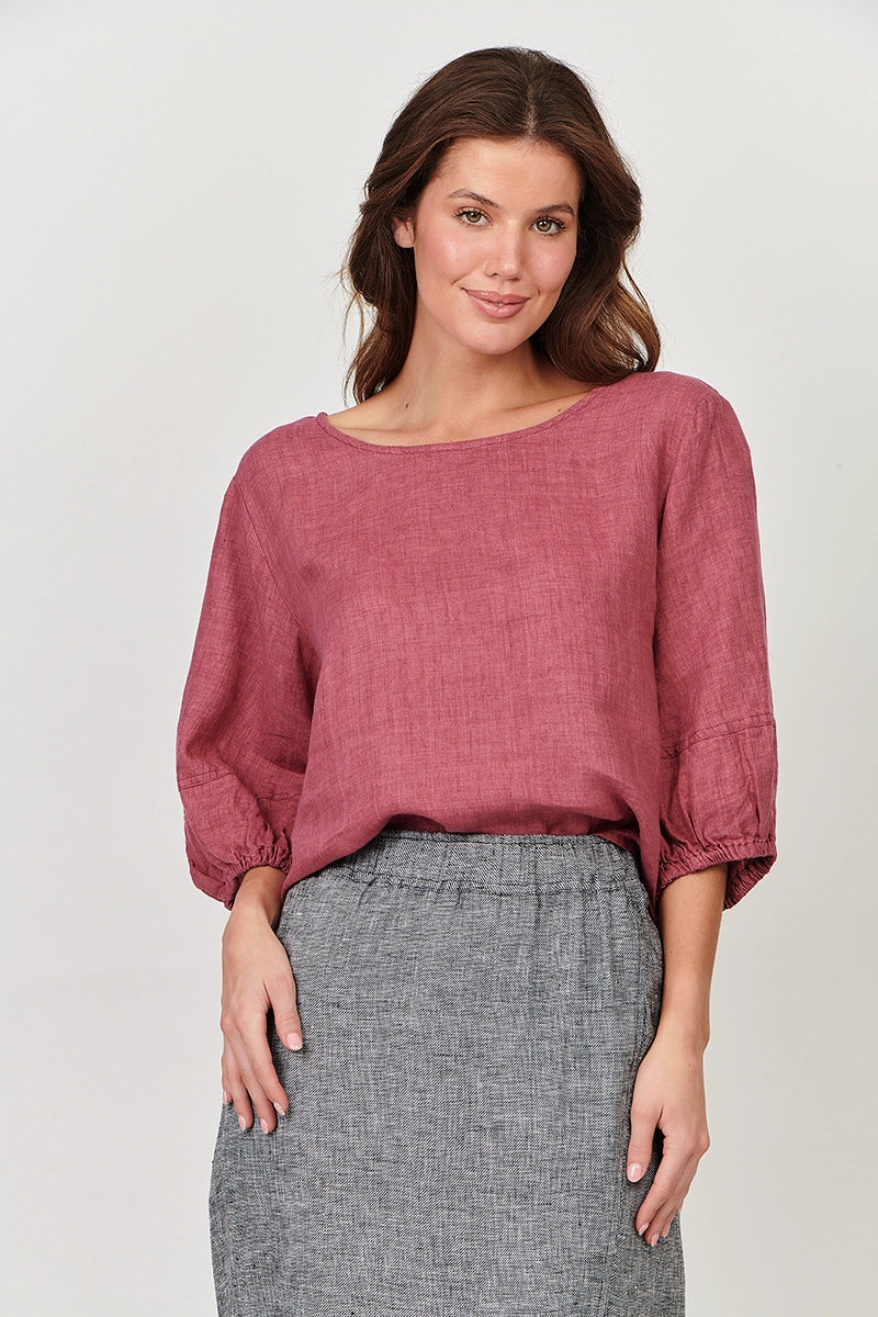 Naturals by O & J Boatneck Linen Top in Rhubarb front view with model arms down