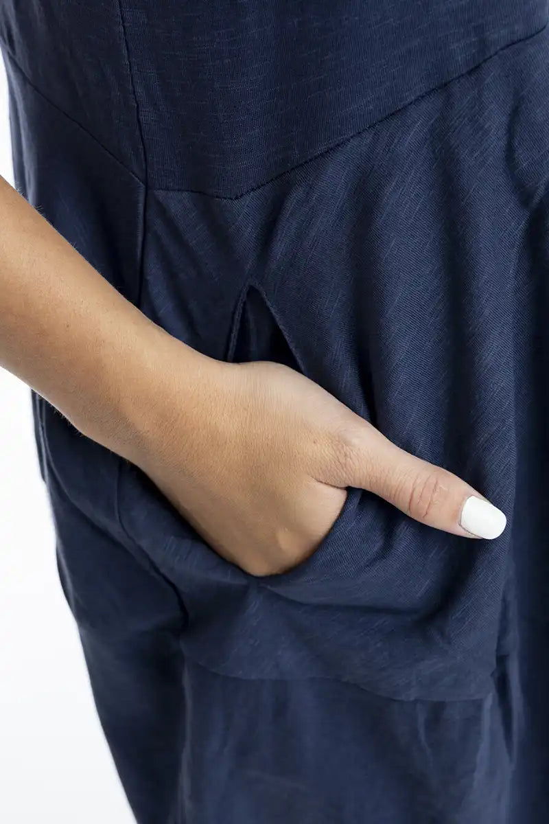 detailed view of the side pocket on the Orientique Essentials Knit Bubble Dress in Navy