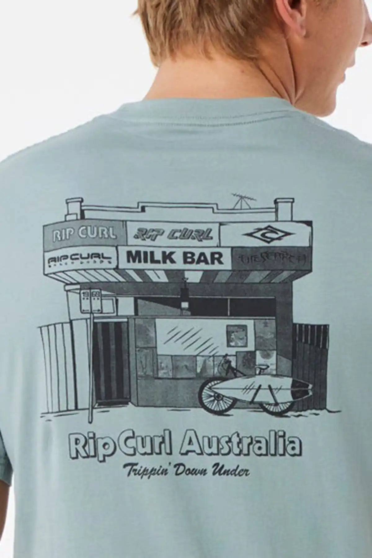 Light blue t-shirt with black graphic design of a milk bar and 'Rip Curl Australia' text.