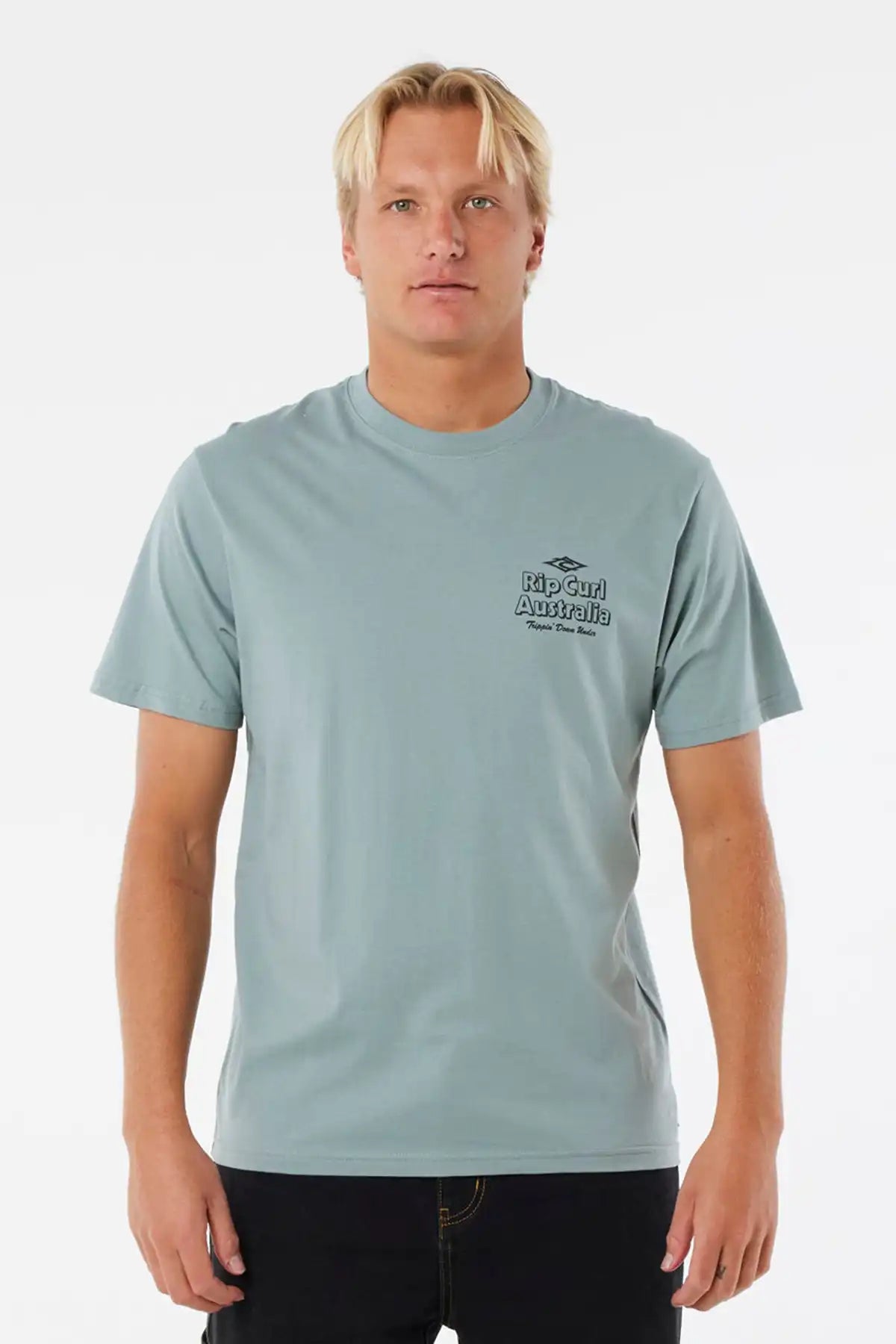 Man wearing a light blue t-shirt with a logo on a white background