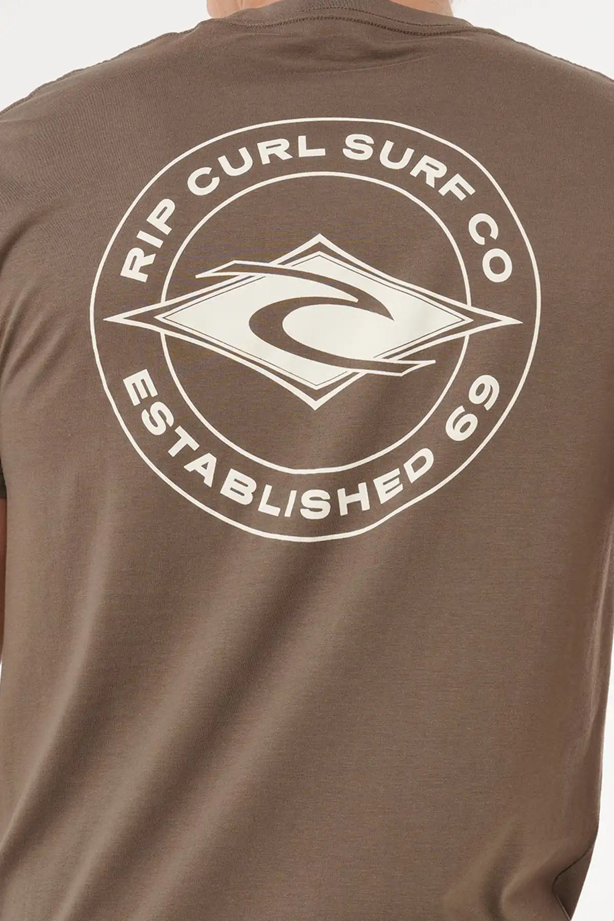 Brown t-shirt with Rip Curl Surf Co logo on the back