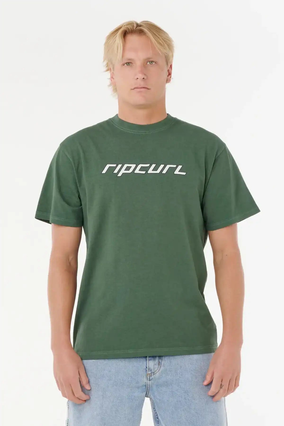 Person wearing a Rip Curl Nu Dosed Tee in Mountain Green on a white background front on view