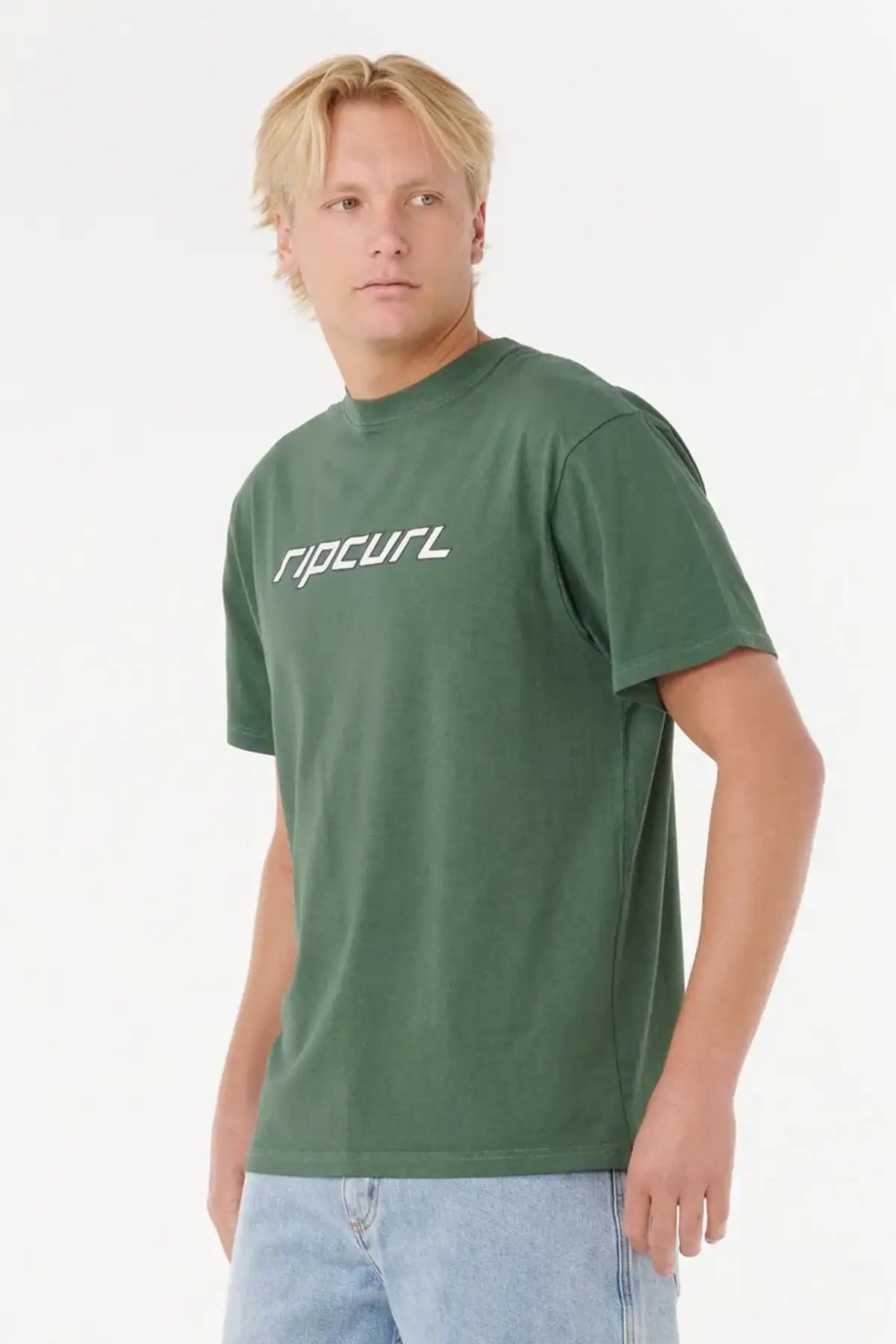 Man wearing a Rip Curl Nu Dosed Tee in Mountain Green on a white background side veiw