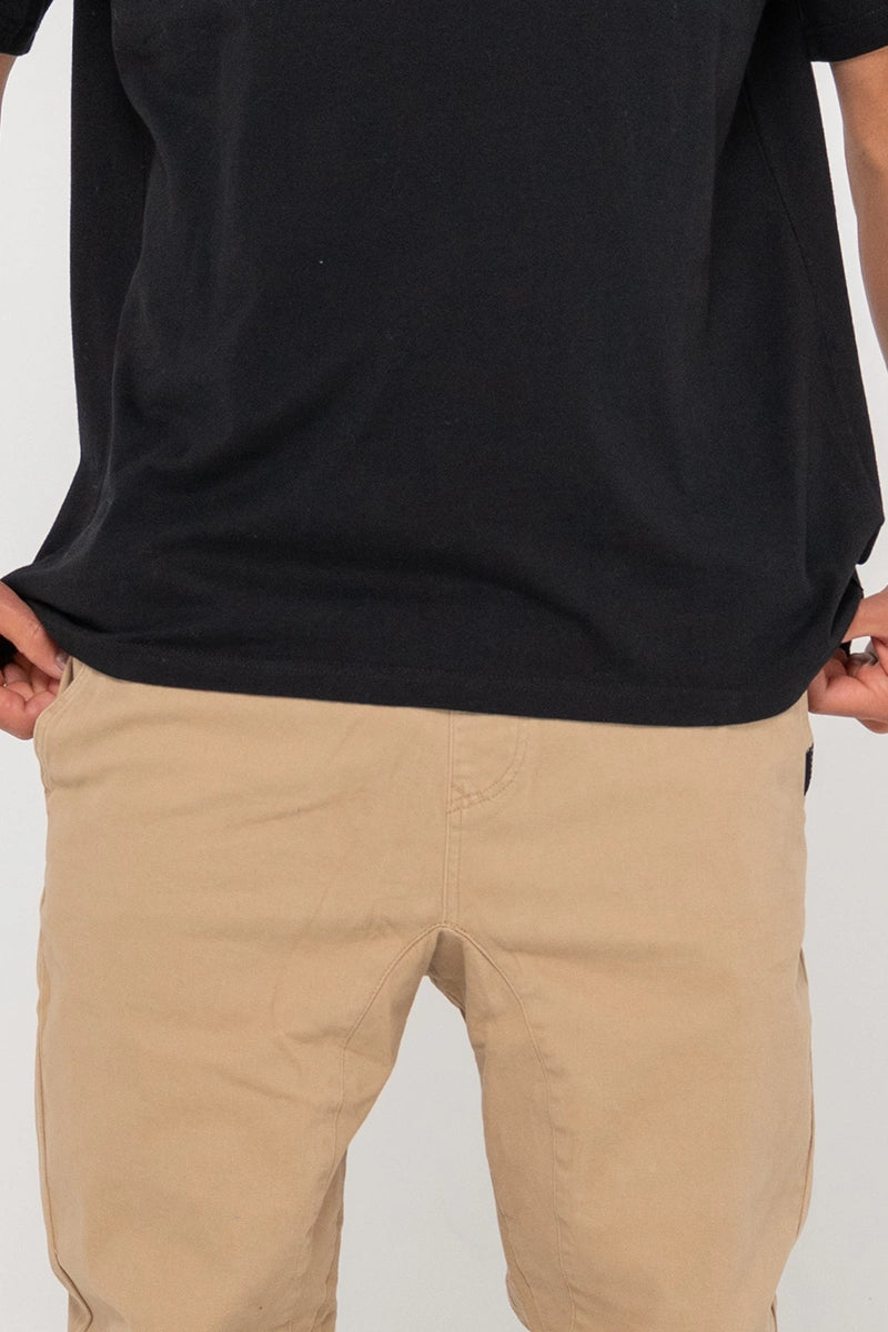 Rusty Mens Pant - Hook Out Slim Fit Elastic in Khaki detailed view of the front waist area