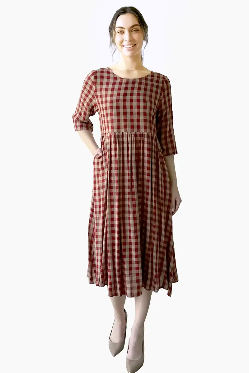 Talia Soft Gingham Dress in Red and Beige with hand in pocket