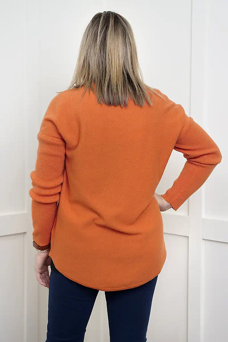 The Rust Glow Lambswool V-Neck Sweater back view