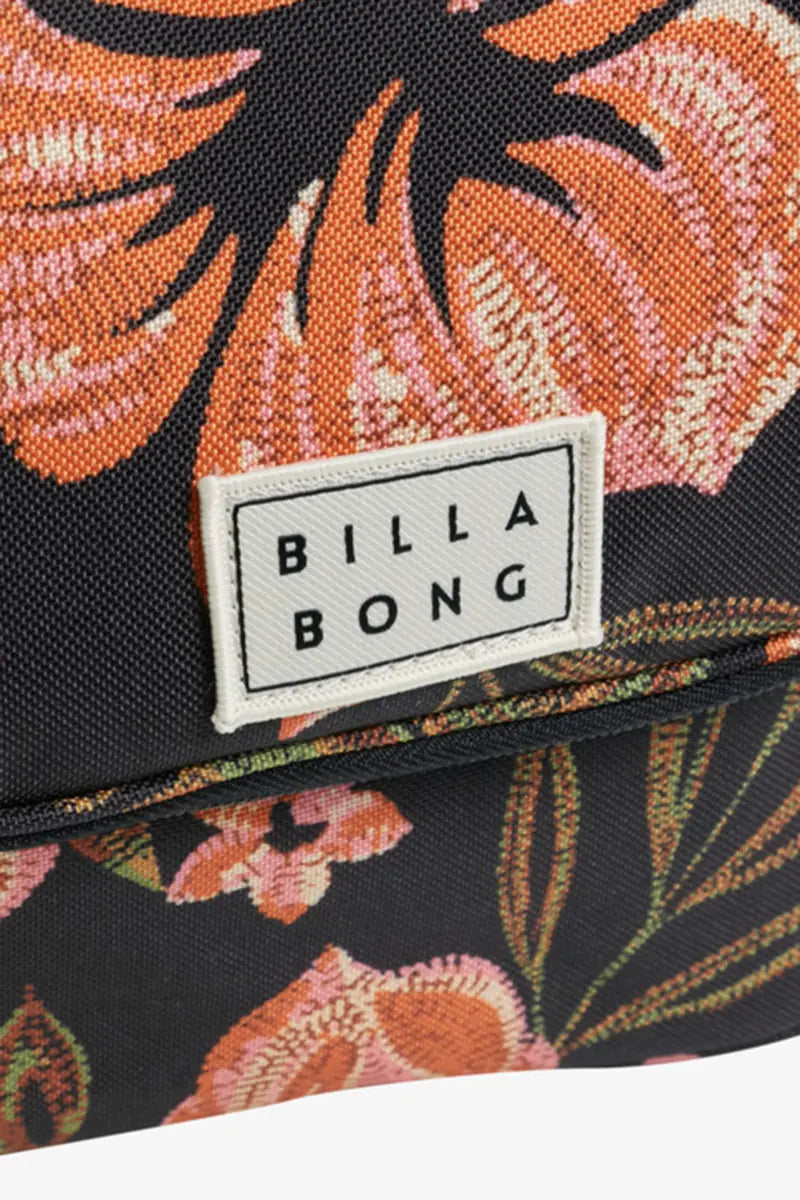 logo badge detail view on the Billabong Women's Travel Beauty Bag in Black Pebble