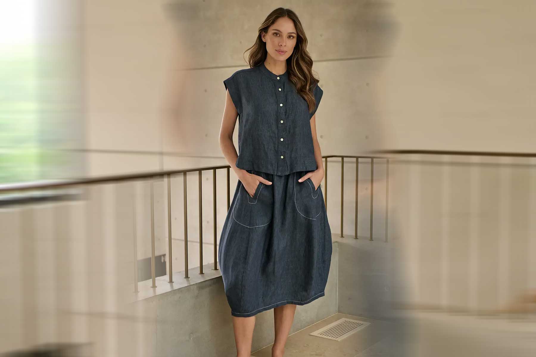 Linen Skirt from naturals by O & J woman standing on landing