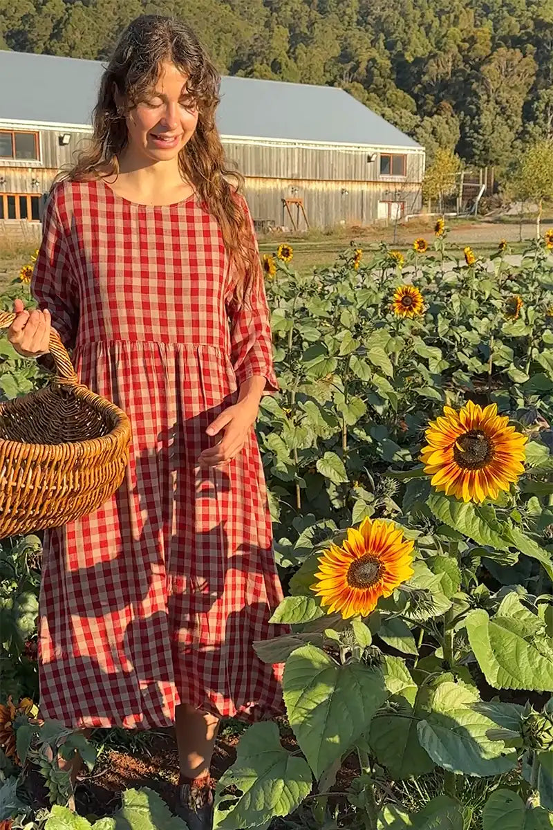 Red Gingham dress front view in the sunflower paddock