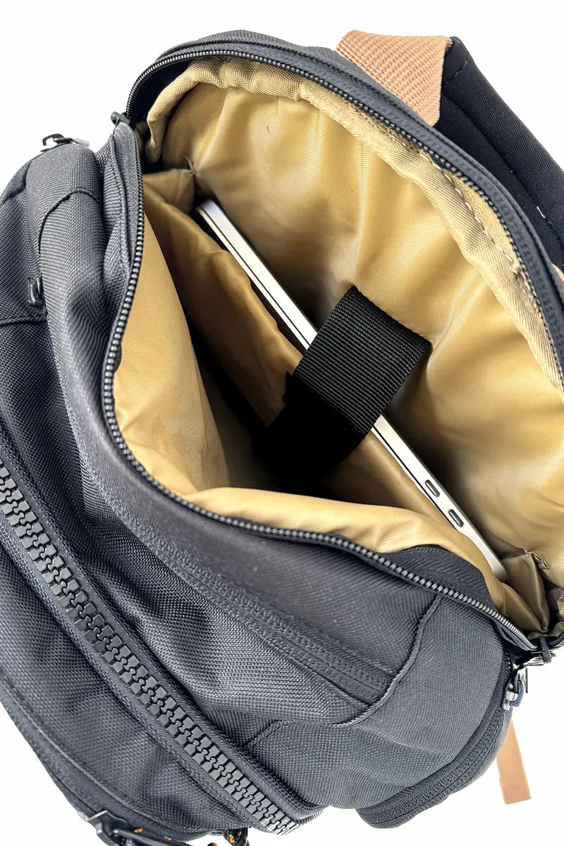 Laptop pocket view of the Billabong Backpack Combat OG in Black Tan