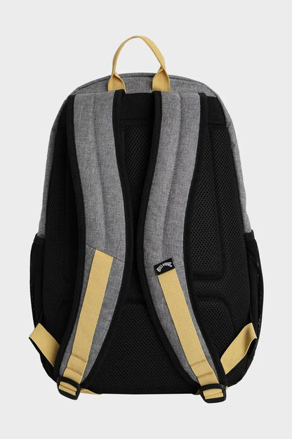Gray Billabong backpack with yellow accents on a white background