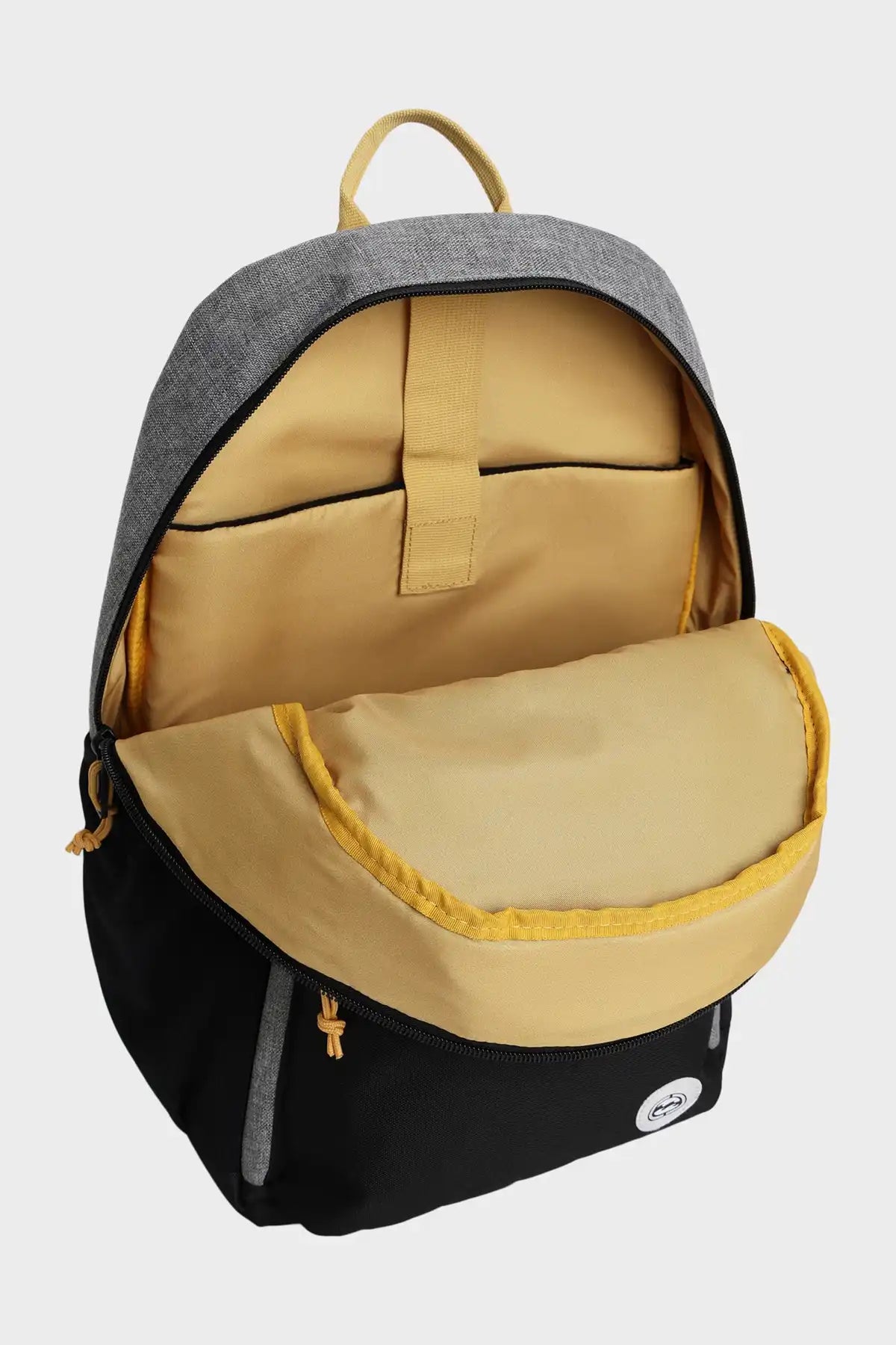 Billabong Scallop Backpack with open compartments showing gray, yellow, and black colors on a white background