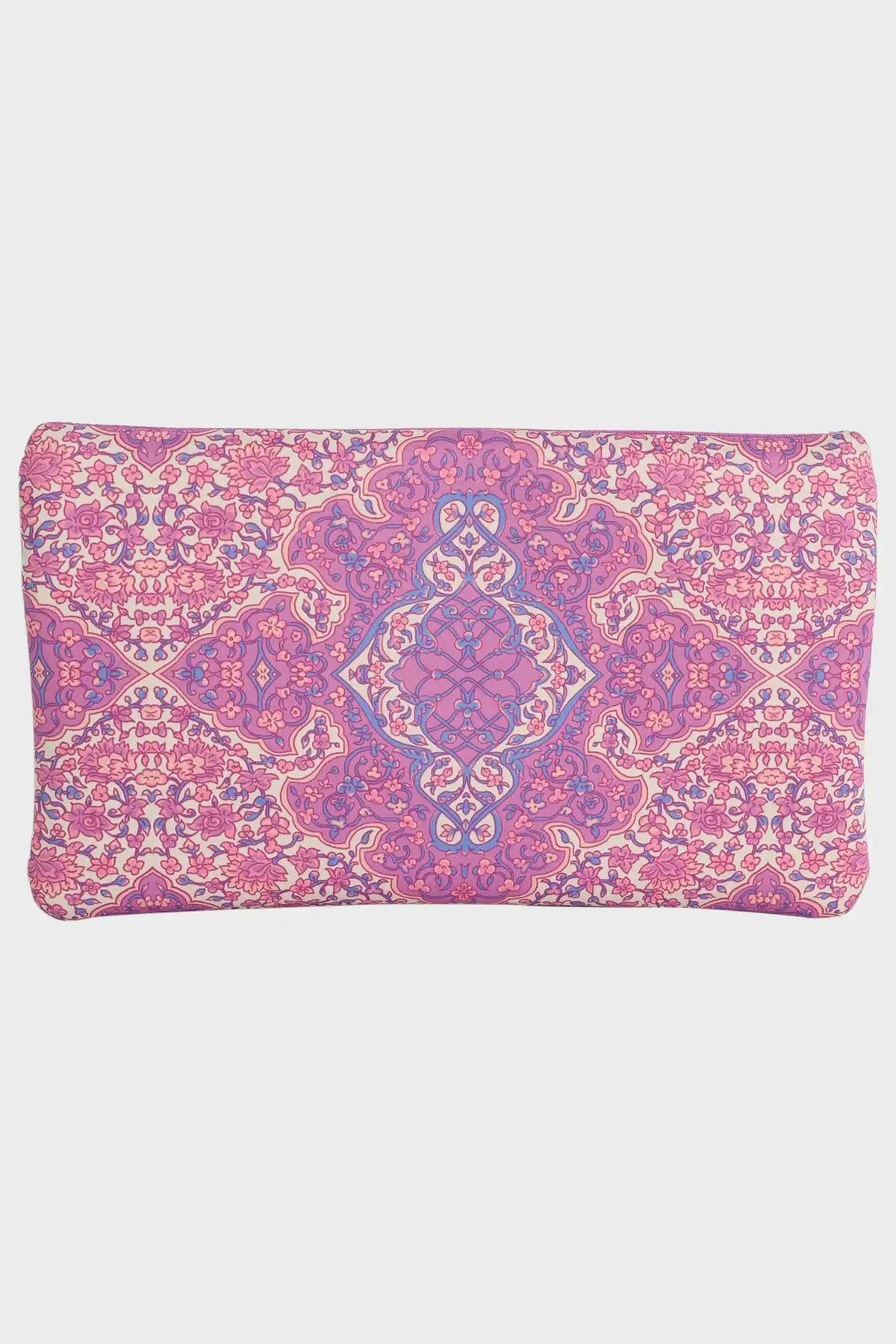 Pink Billabong and purple patterned clutch bag on a white background back view.