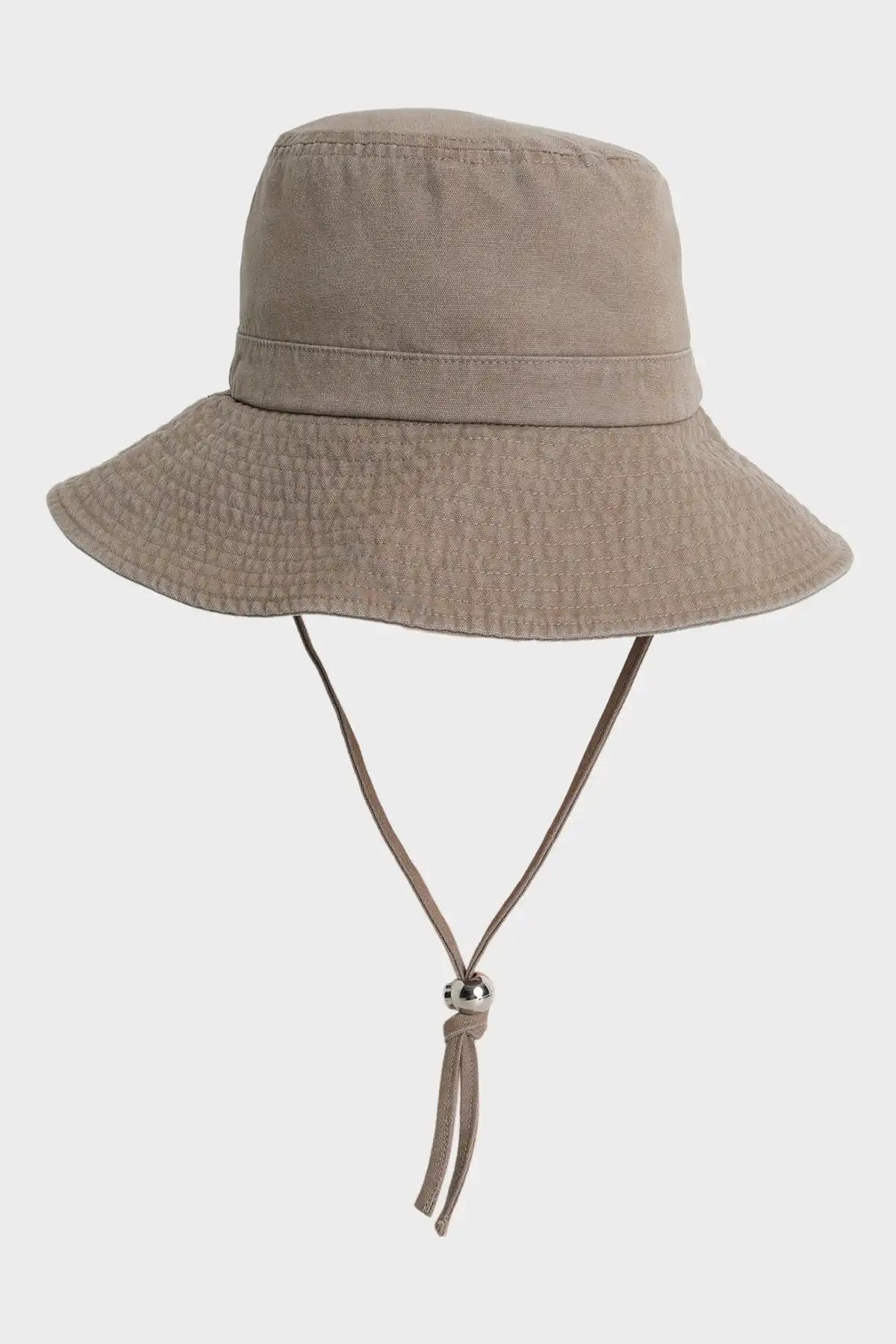 Billabong Mushroom bucket hat with a tie on a light gray background