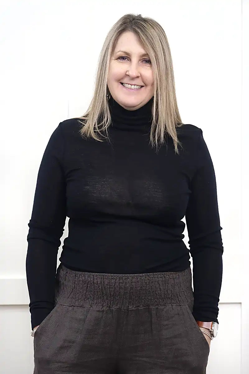 Chille Merino Whisper Top in black front view tucked in