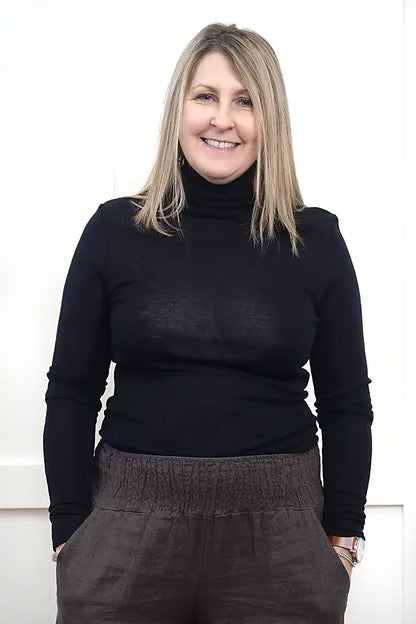 Chille Merino Whisper Top in black front view tucked in