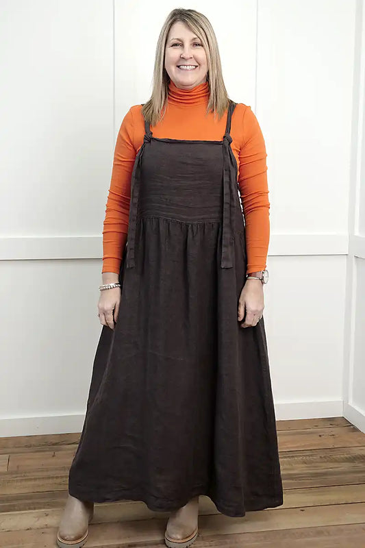 Chille Merino Whisper Top in orange under chocolate sofia pinafore dress front view