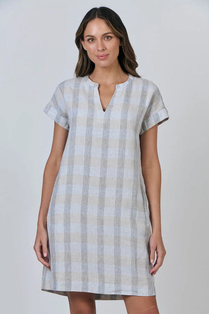 Woman wearing a Coastal Drift Linen Dress in Mesh against a plain background