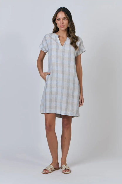 Woman wearing a Coastal Drift Linen Dress in Mesh on a white background full model front view