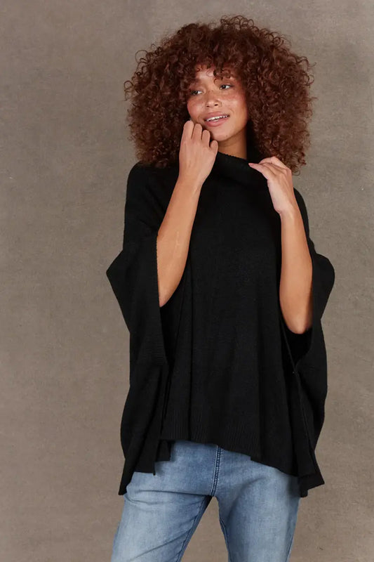 close up front view of Eb & Ive Nawi Poncho in Ebony