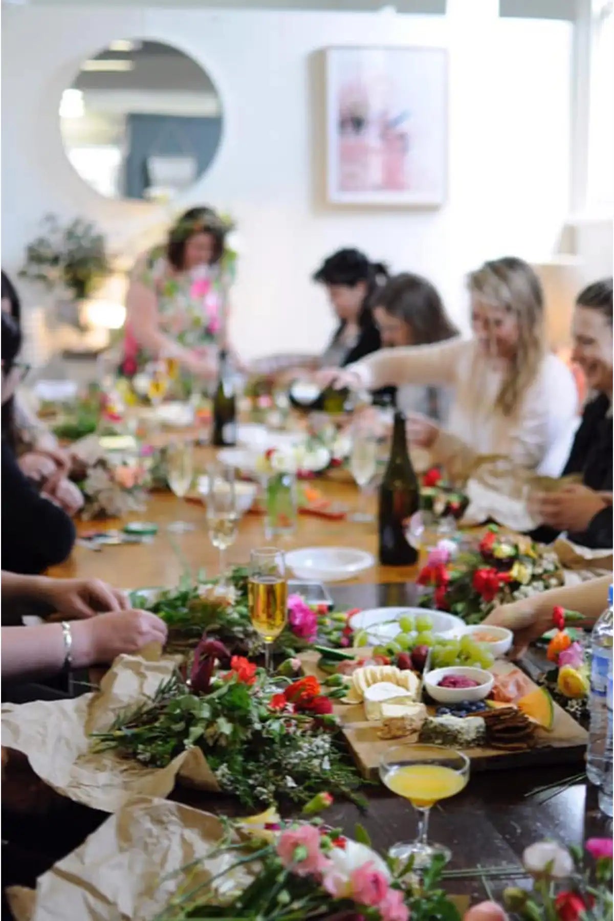 Flower Crown DIY experience working together at the long table