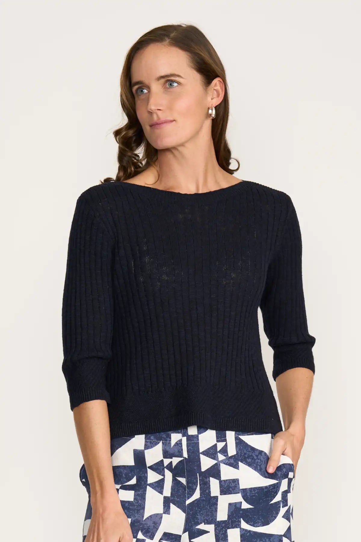 Woman wearing a Foil Nitty Gritty Sweater in True Navy with a white background front view