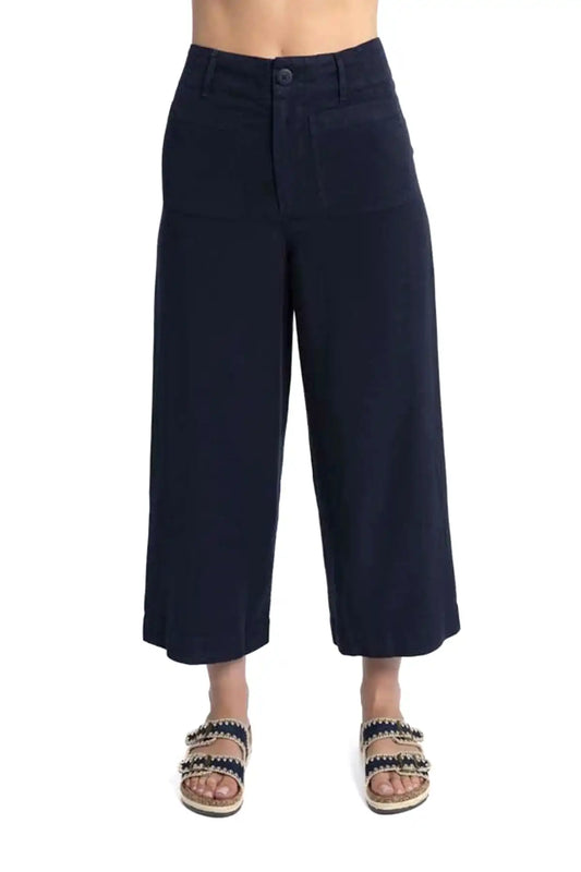 Humidity Marley Pant - Navy blue wide-leg pants worn by a person on a white background - front view