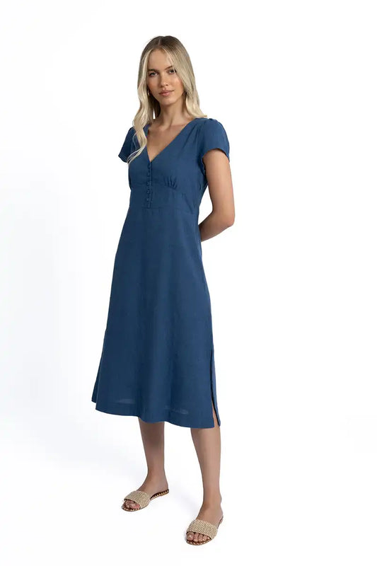 Woman wearing a blue dress on a white background