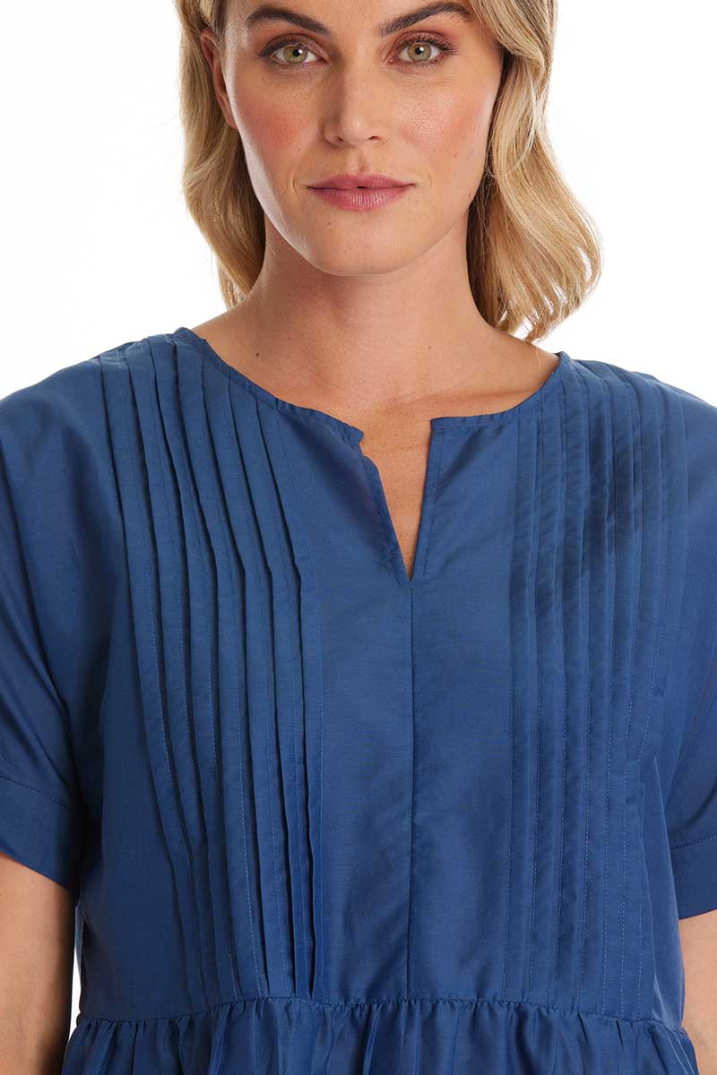 detailed view of the front pleat and neckline on the Marco Polo S/S Pleat Front Top Indigo