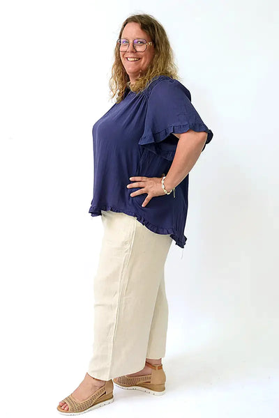 Monique Peasant Top in Navy Frill Hem side view