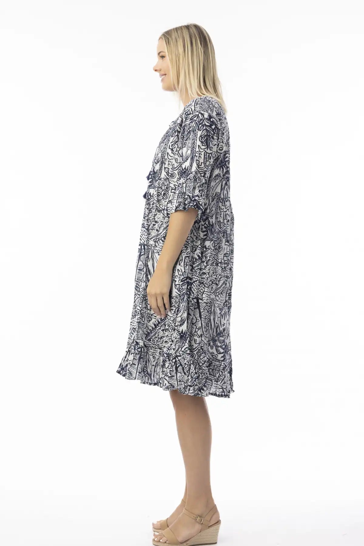 Woman wearing a   Orientique Aksharay Navy Dress on a white background