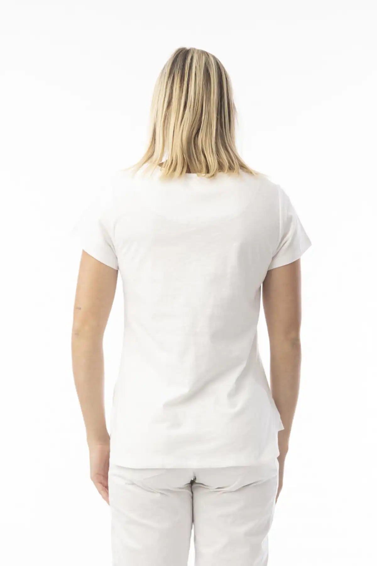 Person wearing a Orientique Essentials Organic Cotton Crew Tee in White from behind and pants on a white background