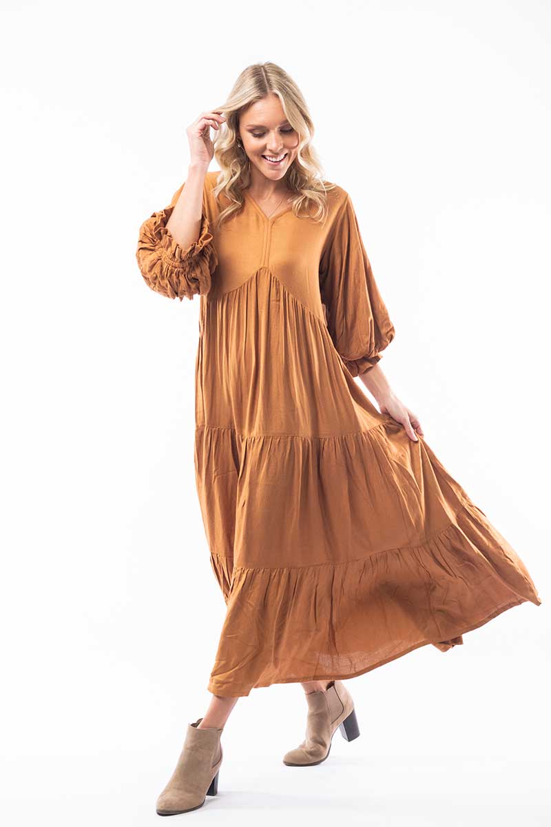 studio image of model wearing Orientique Solid Moss Maxi Dress in Umber