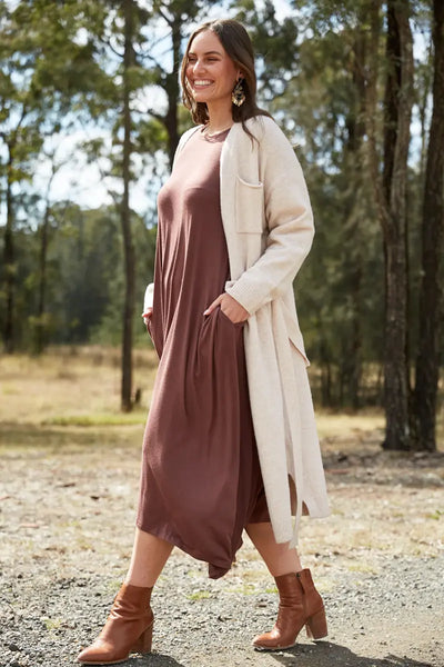 Paarl Longline Cardigan in Oat by Eb & Ive with model walking and cardigan open