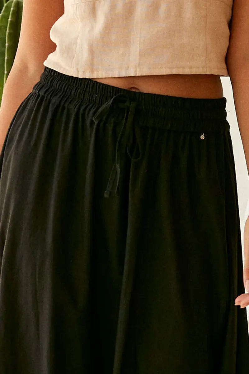 waist detail on the Buddha Wear Pippa Midi Skirt in Black