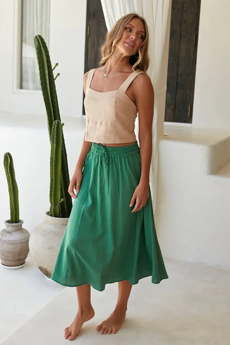 side view of the Buddha Wear Pippa Midi Skirt in Green