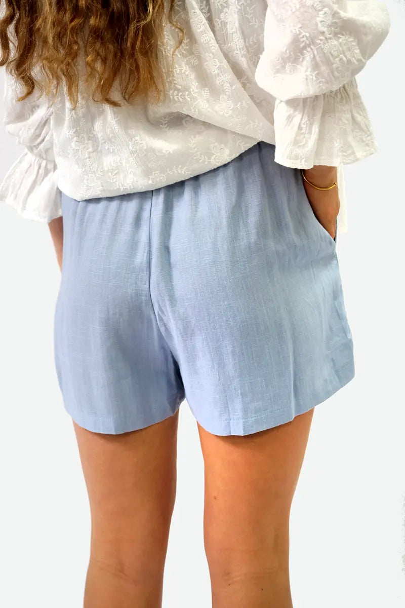 back view of the Pull on Linen Shorts in Powder Blue
