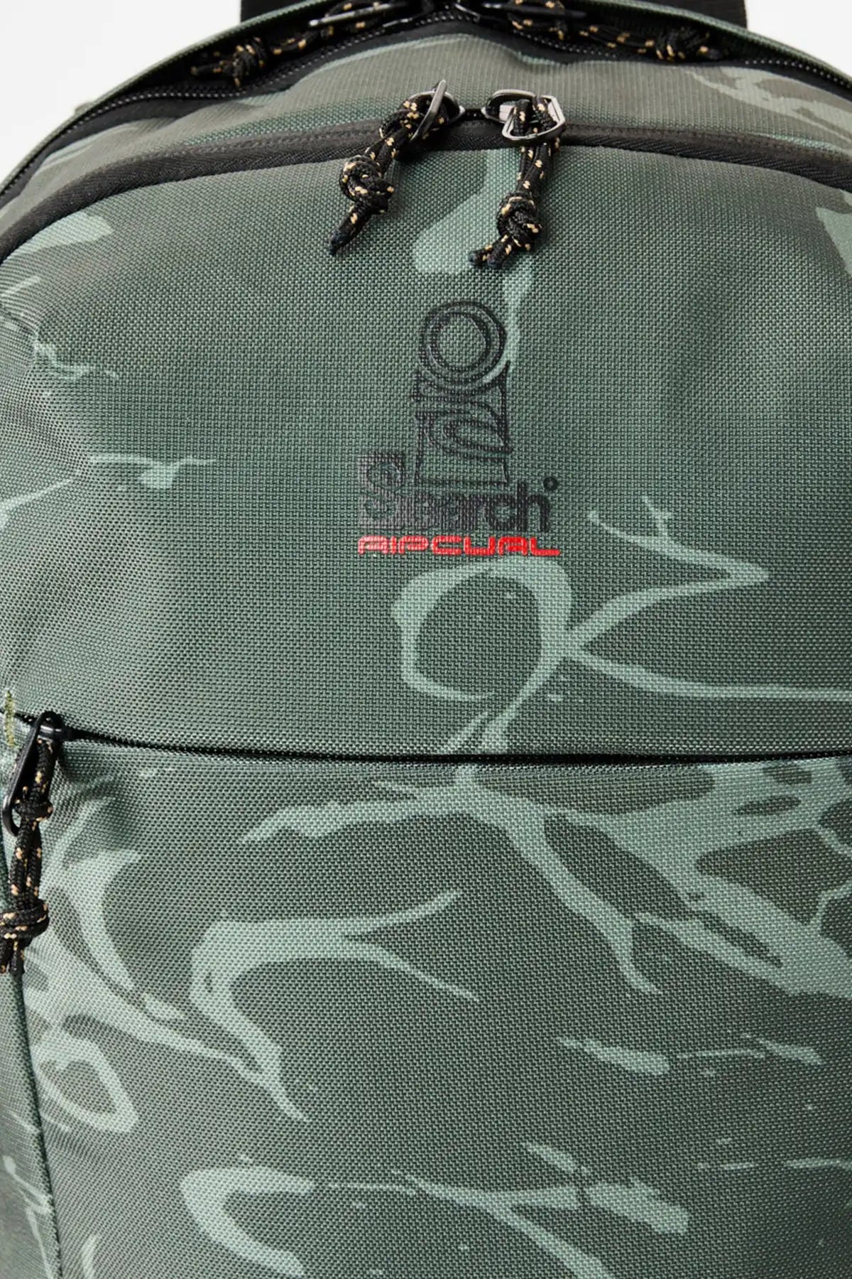 Rip Curl Green camouflage backpack with a brand logo on a gray background