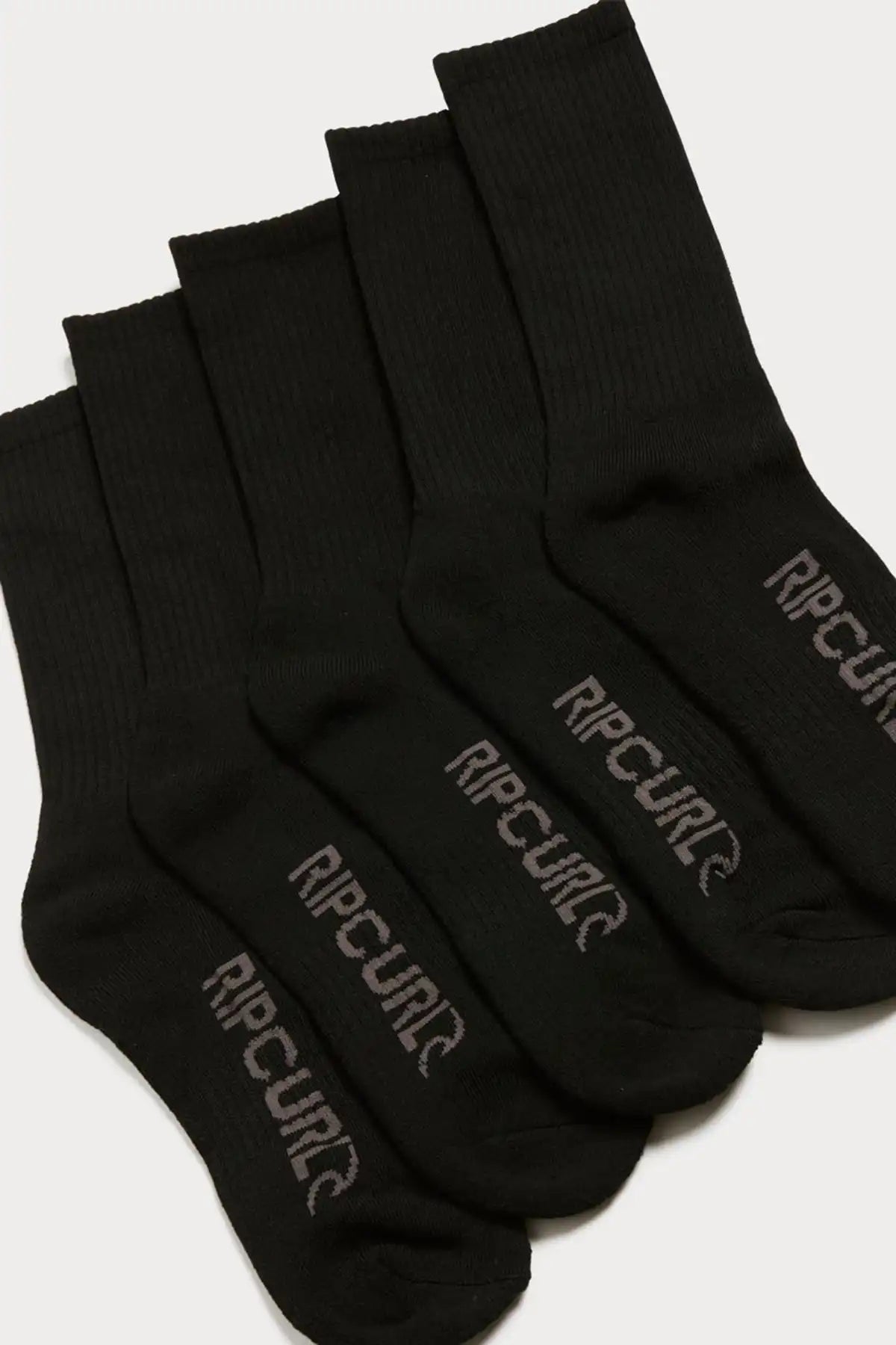 Set of black socks with Rip Curl logo on a white background