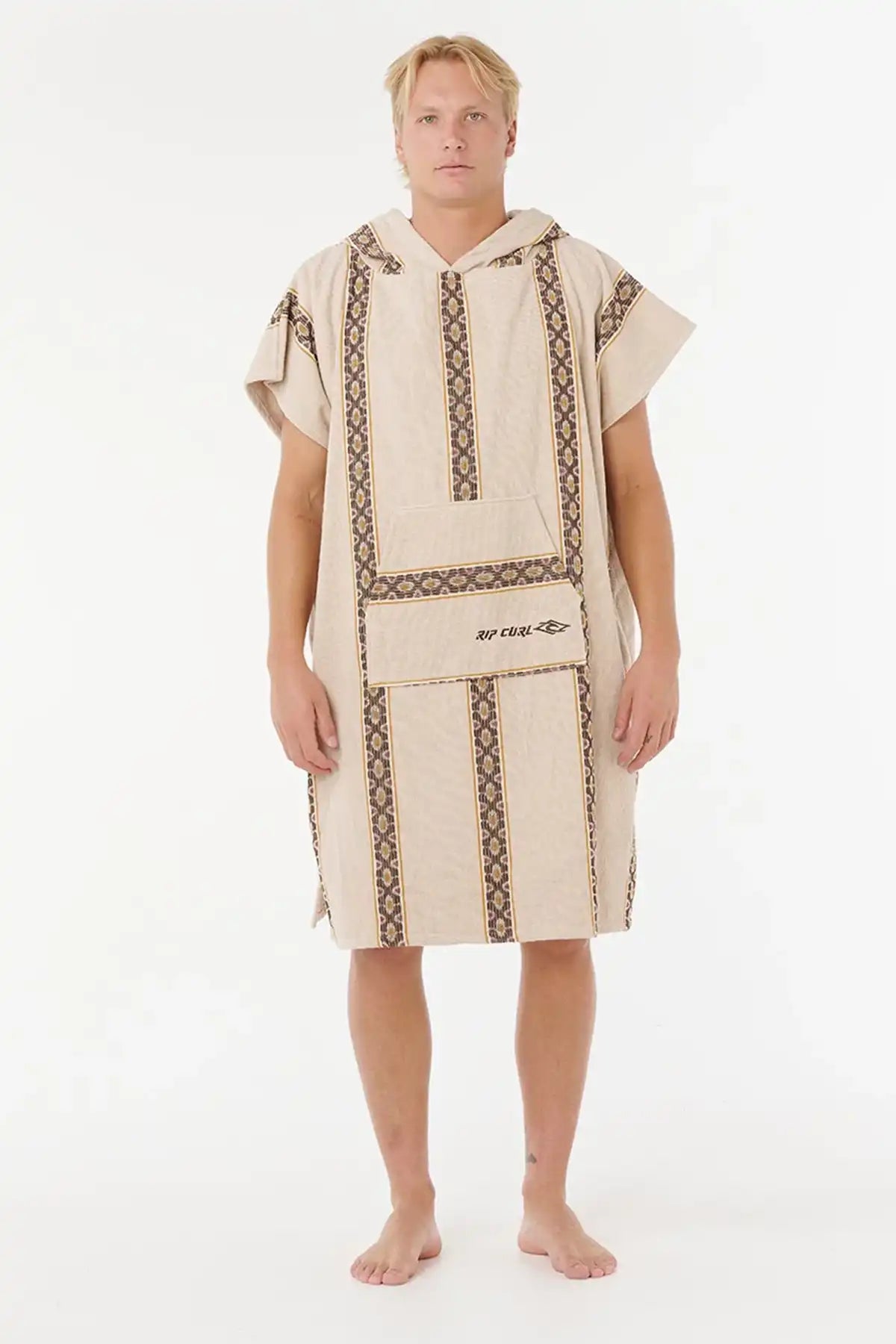 Man wearing a beige towel with brown embroidery on a white background