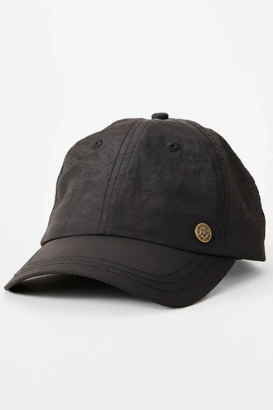Black cap with a gold Rip Curl logo on a white background