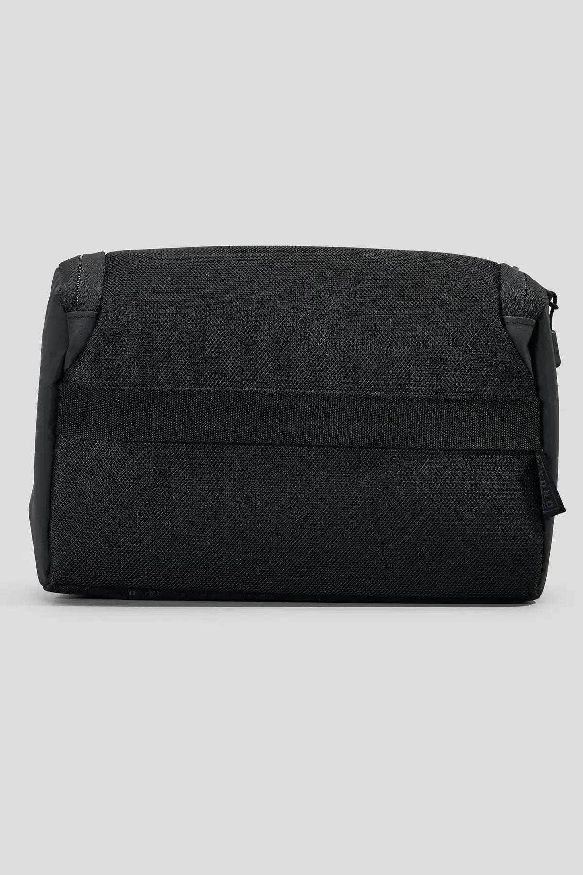 Black Rip Curl F-Light Icons toiletry bag on a light gray background